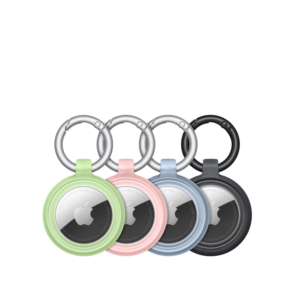 Négy Otterbox Lumen Series tok, bennük egy-egy AirTaggel, jól látszik az Apple-logó