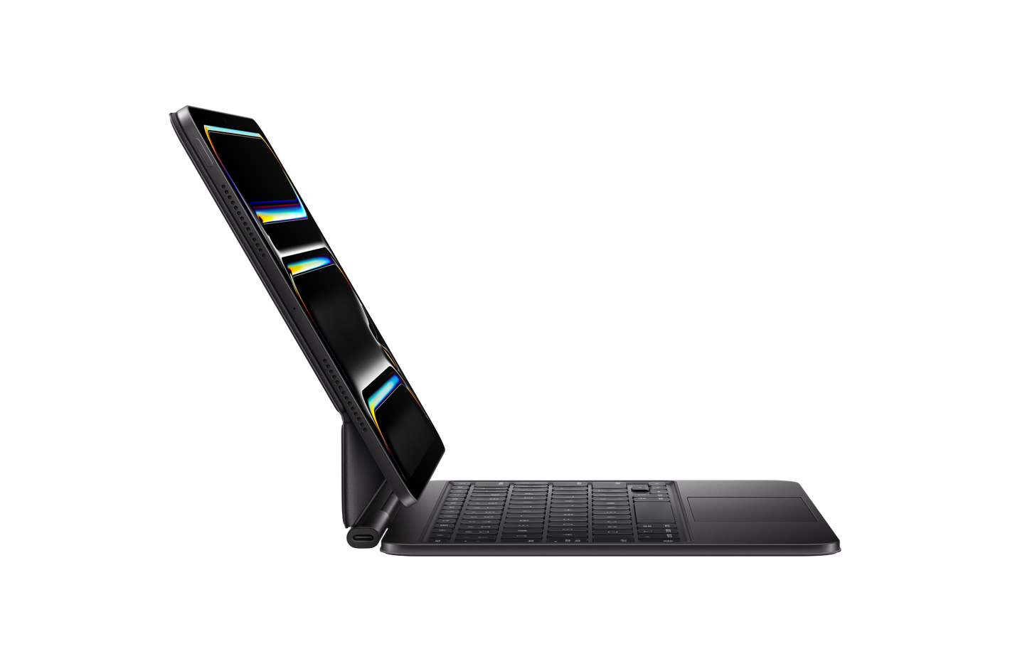 Magic Keyboard’a takılı, yatay pozisyonda iPad Pro’nun yandan görünümü, Siyah, yan kısmı arkaya yatırılmış, katlama kısmının yakınında şarj bağlantı noktası, askı modeli tasarımı