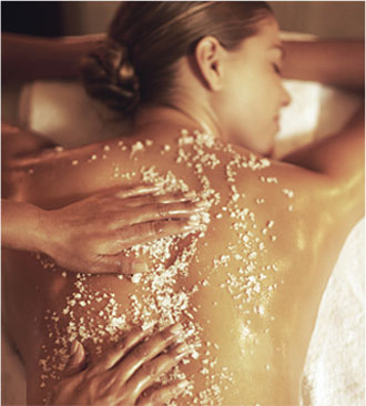 woman receiving a salt massage