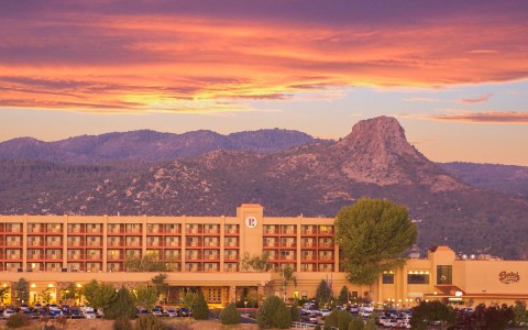 aerial view of hotel exterior and fiery red clouds