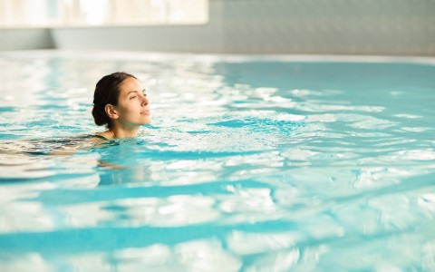 woman swimming in a pool