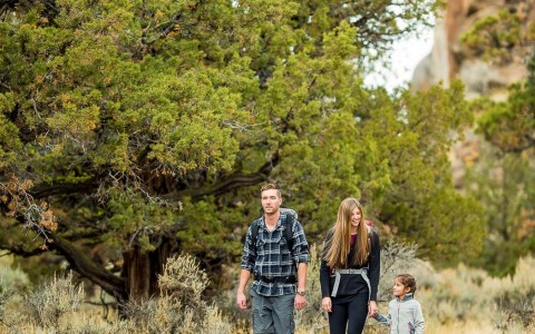 family on a hike sunny