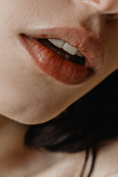 Close up of sensual big plump red lips of anonymous woman 