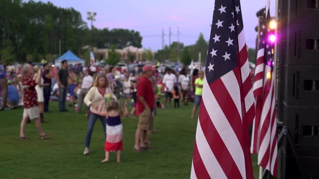 July 4th Celebration with US flag and people dancing 4