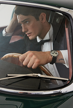 Man driving with Marlin® Chronograph Tachymeter 40mm Stainless Steel Bracelet Watch on his wrist