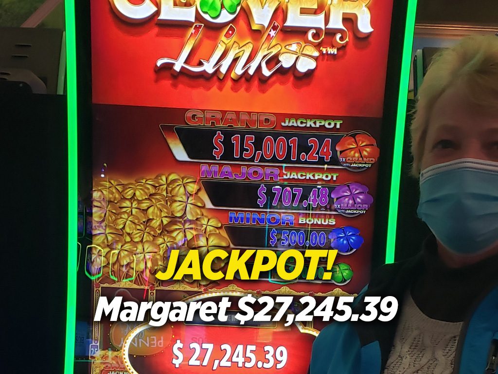 A sign advertising the clover link jackpot.