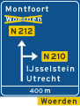 K9: Diversion with alternative route shown on an advance warning panel for a non-motorway highway