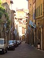 Via Duprè, the main street of this Contrada, decorated with Onda's flags