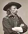 Brevet Major General George A. Custer, USA, seated, in field uniform, 1865