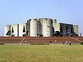 Image 6Jatiyo Sangsad Bhaban is the National Assembly Building of Bangladesh, located in the capital Dhaka. It was created by architect Louis I. Kahn and is one of the largest legislative complexes in the world. It houses all parliamentary activities of Bangladesh. Photo Credit: Karl Ernst Roehl