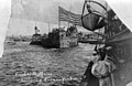 The refloated stern of the Maine is towed out of Havana Harbor,