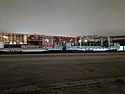 Flatcars with Holiday Train decorations at 4th & Townsend