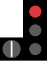 A traffic light with attached tram signal lamp, indicating proceed to trams.