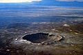 Image 33Meteor Crater in Arizona. Created 50,000 years ago by an impactor about 50 metres (160 ft) across, it shows that the accretion of the Solar System is not over. (from Formation and evolution of the Solar System)