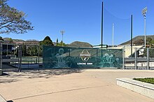 Signage announcing the construction zone for Cal Poly's upcoming John Madden Football Center is shown at the San Luis Obispo campus in May 2023.