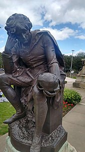 Photo showing a statute of Hamlet holding a skull, from the infamous 'Alas poor Yorick' scene.