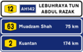 Federal Road distance sign with road name and Asian Highway route shield