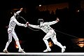 Image 22 Fencing Photo: Marie-Lan Nguyen Fencing is the sport of fighting with swords; in modern usage the word usually denotes competitive fencing, rather than classical fencing. Here, Fabian Kauter (right) hits Diego Confalonieri (left) with a flèche attack at the final of the Challenge Réseau Ferré de France–Trophée Monal 2012. More selected pictures