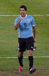 Suárez celebrating scoring
