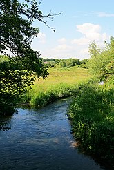 Upstream of River Meon as it crosses Ironmill Lane, Fareham, north of the M27 motorway