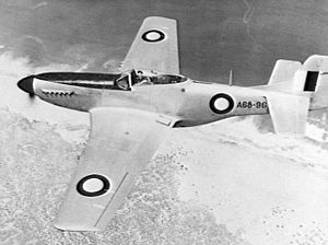 Overhead shot of single-engined fighter aircraft in flight