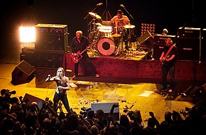 The Stooges at the Hammersmith Apollo (2010) L-R: Iggy Pop, Mike Watt, Scott Asheton, James Williamson