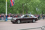 The groom travelled to the ceremony in a Bentley State Limousine with his brother and best man (left) and the bride in a Rolls-Royce Phantom VI 'Silver Jubilee Car' with her father (right)