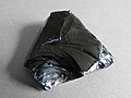 A piece of volcanic obsidian glass