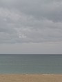 Sandstrand, Lake Michigan und Wolken