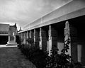 Part of central courtyard and overhanging with stairway leading to roof terrace, 1921