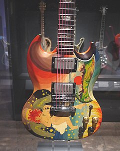 The Fool SG (1964 Gibson SG) played by Eric Clapton (Cream), present from George Harrison to Eric Clapton (Cream), painted in 1967 by The Fool Collective - Play It Loud. MET (2019-05-13 19.29.10 by Eden, Janine and Jim).jpg