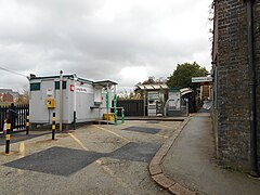 Station entrance and ticket office cabin.