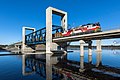 Image 3A Sr1-pulled lumber train crossing the drawbridge along the Savonia railway in Kuopio, Finland (from Rail transport)