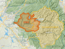 The Rim Fire is shown in orange having burnt into the Stanislaus National Forest (in green) and northwestern portions of Yosemite National Park (in gold stripes).
