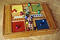 Image 21Parcheesi is an American adaptation of a Pachisi, originating in India. (from Game)