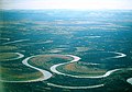 Image 19The Nowitna River in Alaska. Two oxbow lakes – a short one at the bottom of the picture and a longer, more curved one at the middle-right. (from Lake)