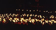 4 – Da Procession. Efter nichtfaa da longship is dragged troo da streets o da toon in a torchlit procession. Da torchbearers ir da members o aa da squads, leyd by da Jarl's Squad. Ivry squad picks a theme an dresses accordinly. Da themes ir very varied, some historical, some topical or satirical.