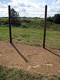 Reconstruction of the "first-generation" fence as erected in 1952, with control strip in the foreground