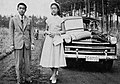 Princess Takako with her older brother Crown Prince Akihito in front of his Prince Sedan in 1954