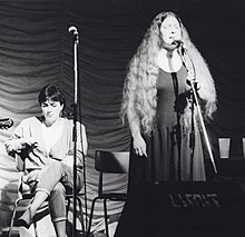 Mary Black sits while Dolores Keane sings with De Dannan at the 1985 Trowbridge Folk Festival