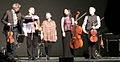 Laurie Anderson amidst the Kronos Quartet in Chicago after performing LANDFALL on 2015-03-17 starting at 20.53.41 (16851029595 is the Flickr set number)