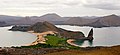 Image 25Pinnacle Rock on Bartolomé Island, with Santiago in the background and a ferry on the right for scale (from Galápagos Islands)