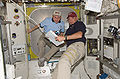 Michael Fincke and Tony Antonelli in Quest airlock of the ISS