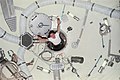 Astronaut Edward Gibson sails through airlock module hatch