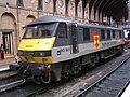 Class 90 (no. 90021) in revised Railfreight triple grey livery, with Railfreight Distribution sector markings.