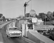 A car stopped a toll booth