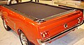 An original Ford Mustang converted into a novelty pool table, exhibited at the 2011 Montreal International Auto Show