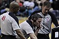 Image 16NBA officials Monty McCutchen (center), Tom Washington (#49) and Brent Barnaky reviewing a play. (from Official (basketball))