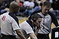 Image 1NBA officials Monty McCutchen (center), Tom Washington (#49) and Brent Barnaky reviewing a play. (from Official (basketball))