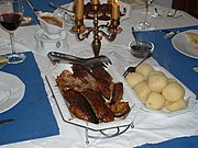 Roast goose with Klöße (dumplings) and red cabbage